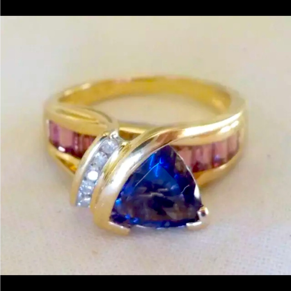 Iolite, ruby and diamond engagement ring size 6.75. 14k yellow gold